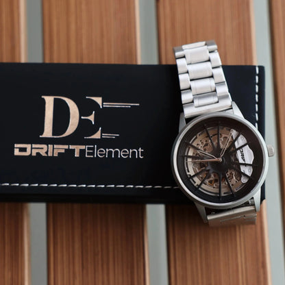 Elegant automatic watch by DriftElement with a rim-inspired design, crafted by a German startup. The unique, innovative styling is intended for car lovers and connoisseurs of distinctive watches.