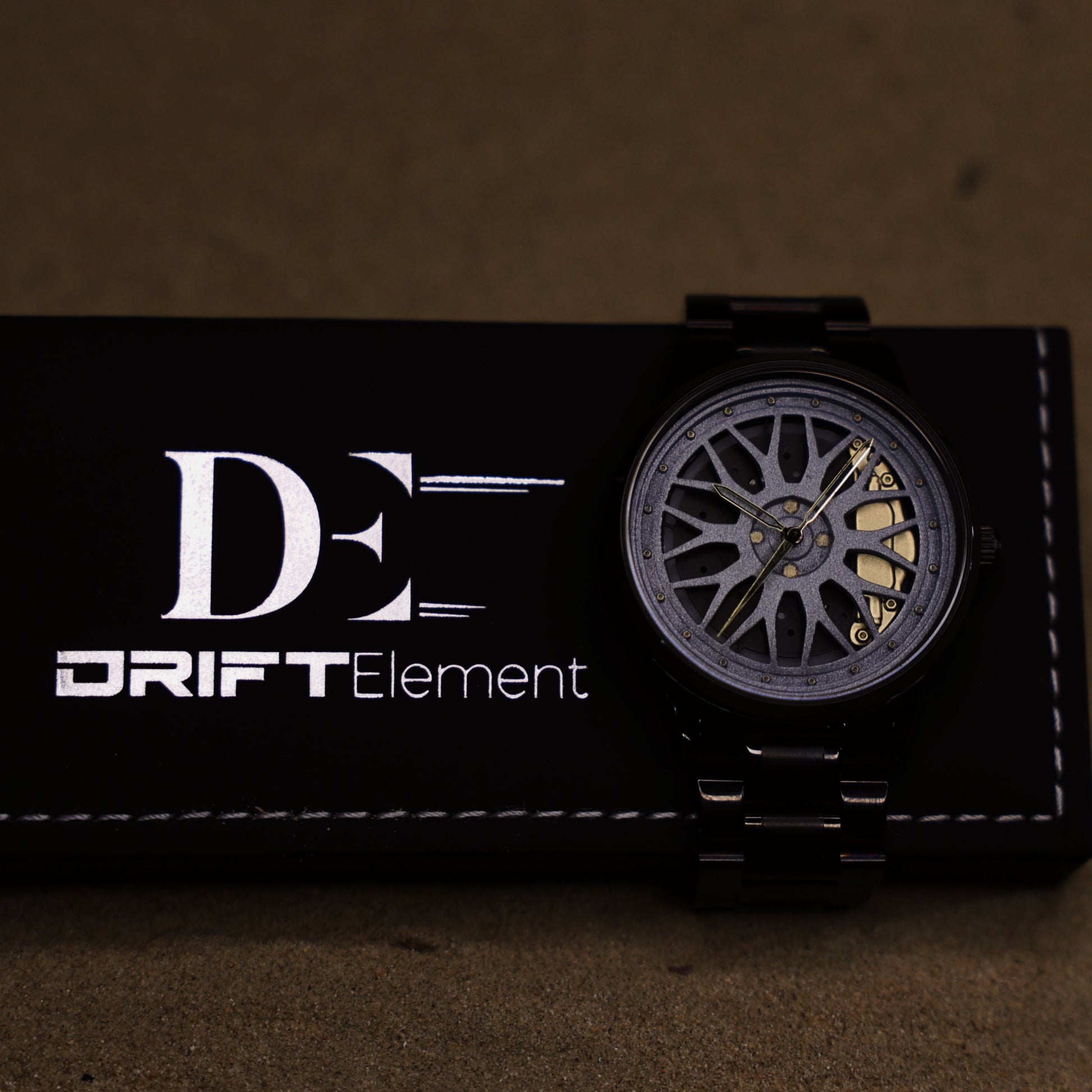 The Final Edition watch by DriftElement, presented on its packaging, features a unique rim-inspired face, showcasing the creative and innovative design that the young German startup is known for in its timepieces.
