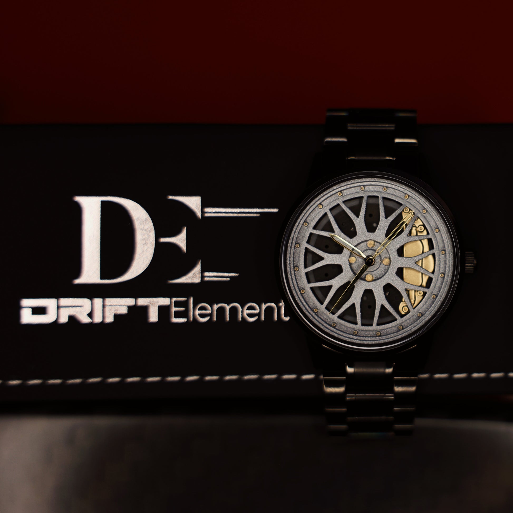 An elegant DriftElement Final Edition watch displaying a sophisticated rim design on its face, indicative of the brand's innovative German engineering. The watch rests against a background with the DriftElement logo, highlighting its status as a flagship piece from the startup's collection.